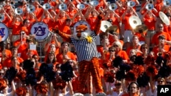 FILE - In this April 14, 2012, photo, Auburn mascot Aubie performs with the Auburn University Marching Band during their annual spring A Day game at Jordan-Hare Stadium in Auburn, Ala.