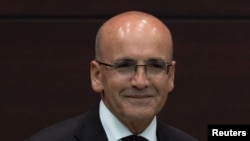 New Treasury and Finance Minister Mehmet Simsek at news conference while Turkish President Tayyip Erdogan announced his new cabinet, in Ankara, Turkey June 3, 2023.