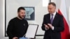 Poland's President Andrzej Duda honors Ukrainian President Volodymyr Zelenskiy with The Order of the White Eagle at the Presidential Palace in Warsaw, Apr. 5, 2023.