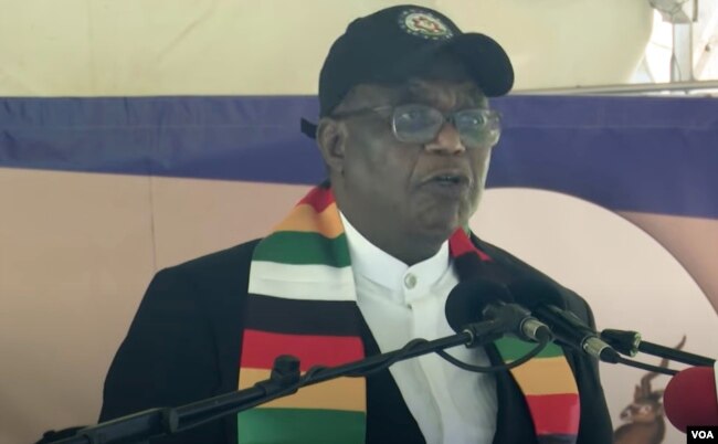 Zimbabwe's Vice President Constantino Chiwenga addresses demonstrators rallying against sanctions imposed on Zimbabwe, Oct. 25, 2023, in Harare. (Columbus Mavhunga/VOA)