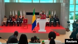 Gabon coup leader General Brice Oligui Nguema is sworn in as interim president during his swearing-in ceremony, in Libreville, Sept. 4, 2023. (Reuters/Gerauds Wilfried Obangome)