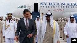 FILE - In this photo released by the Syrian Presidency, Syrian President Bashar Assad, left, speaks with UAE President Sheikh Mohammed bin Zayed Al-Nahyan, in in Abu Dhabi, United Arab Emirates, March 19, 2023.