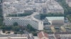 FILE - A photograph taken from the top of the Eiffel Tower shows an aerial view of Paris, with the UNESCO headquarters building, July 15, 2020.