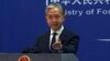 FILE - In this image from video, Chinese Foreign Ministry spokesperson Wang Wenbin gestures as he speaks during a media briefing at the ministry in Beijing, Feb. 13, 2023.