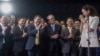 Thailand's Prime Minister-designate Paetongtarn Shinawatra, right, gestures to members of Pheu Thai party as she talks to reporters during a press conference at Pheu Thai party headquarters in Bangkok, Thailand, Aug. 16, 2024.