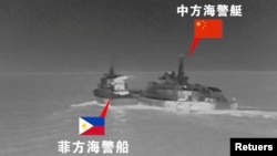 (FILE) A Philippine coast guard vessel and a Chinese coast guard vessel sail next to each other during an incident in the South China Sea, August 19, 2024. 