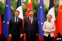 China's President Xi Jinping, his French counterpart Emmanuel Macron and European Commission President Ursula von de Leyen meet in Beijing, Apr. 6, 2023. (Photo by Ludovic Marin/ Pool / AFP)