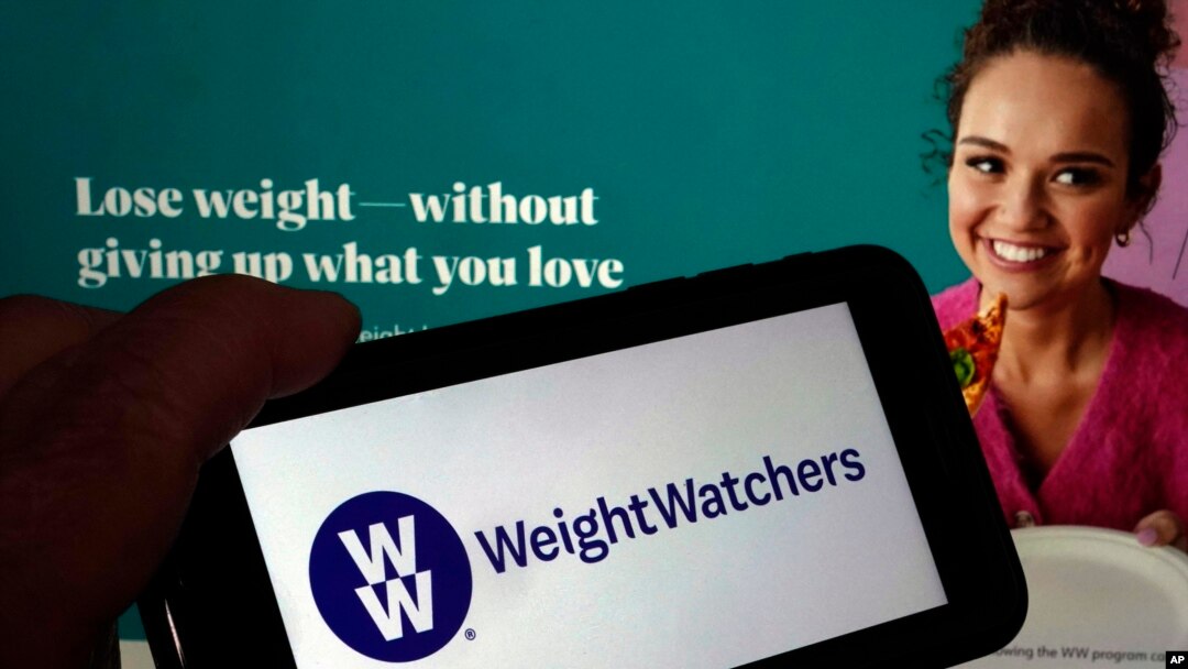 This image shows the logo of WeightWatchers and the company's website, in New York, March 7, 2023. The company said this week it was getting into the prescription drug weight loss business with the acquisition of a telehealth company whose providers prescribe them.