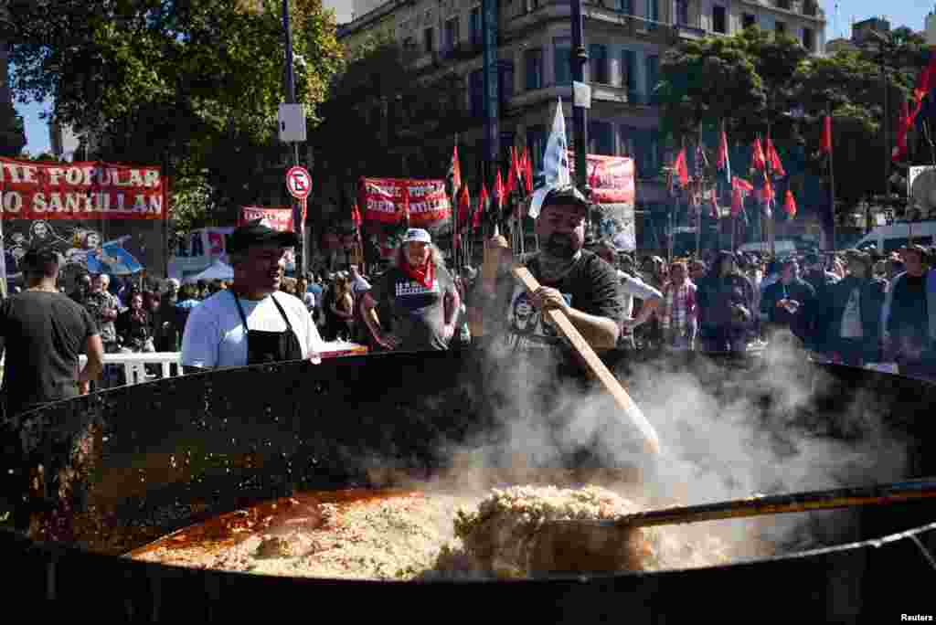 A view of the giant pot with chicken stew, as Union members participate in a march during May Day celebrations, in Buenos Aires, Argentina.