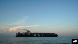 FILE - A container ship is seen outside Norfolk, Virginia, Aug. 14, 2023. Yemen's Iran-backed Houthi militia claimed responsibility for a missile attack on an MSC Mediterranean Shipping vessel in the Red Sea on Dec. 26, 2023.