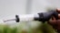 Water hyacinth eating bugs called Megamelus scutellaris are displayed inside a vacuum at the Grootvaly Blesbokspruit wetland reserve, near Springs, in the east of Johannesburg, South Africa, Feb. 15, 2023.