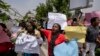 Demonstrators accusing the election commission of irregularities and disenfranchising voters make a protest in downtown Abuja, Nigeria Tuesday, Feb. 28, 2023.