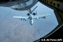 A U.S. Air Force A-10 Thunderbolt II receives fuel from a KC-135 Stratotanker near the Strait of Hormuz, July 21, 2023.