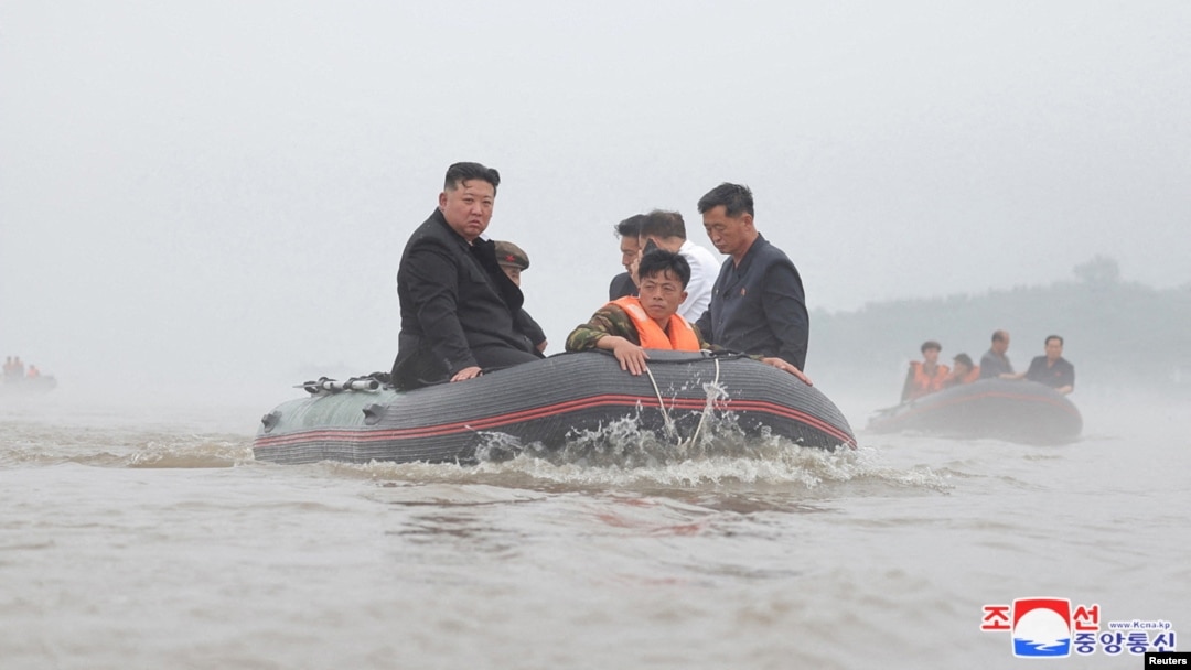 North Korean leader Kim Jong Un and Premier Kim Tok Hun visit a flood-affected area near the border with China, in North Pyongan province, in this undated photo released July 31, 2024 by North Korea's official Korean Central News Agency.