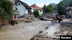 A view of the damage in the aftermath of floods in Crna na Koroskem, Slovenia, Aug. 7, 2023. Major highways in the country remain closed and bridges have collapsed.
