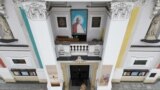 An Image of Pope John Paul II is seen on the Basilica of the Presentation of the Blessed Virgin Mary in Wadowice, the birth place of Pope John Paul II, Poland, March 15, 2023. 