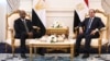 In this photo provided by the media office of Egypt's presidency, Egyptian President Abdel-Fattah el-Sissi, right, meets with Sudan's army chief General Abdel Fattah al-Burhan, at the Presidential palace in el-Alamein city, Egypt, Aug. 29, 2023.