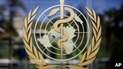 FILE - The logo of the World Health Organization is seen at the WHO headquarters in Geneva, Switzerland. The U.N. health agency listed, Nov. 5, 2024, 17 pathogens that cause widespread disease and death, including HIV, malaria and tuberculosis.