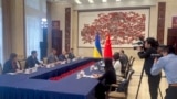 In this image from a video released by Ukraine's Ministry of Foreign Affairs, Ukraine's Foreign Ministry Dmytro Kuleba holds talks with China's Foreign Minister Wang Yi at a meeting in the southern Chinese city of Guangzhou, July 24, 2024.
