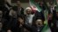 Supporters of a group of candidates chant slogans during their election campaign rally ahead of the March 1 parliamentary and Assembly of Experts elections, in Tehran, Iran, Feb. 28, 2024.