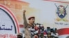 Houthi military spokesperson Yahya Saree delivers a statement in which he claimed an attack on the ship Lobivia, during a pro-Palestinian rally in Sanaa, Yemen, July 19, 2024.