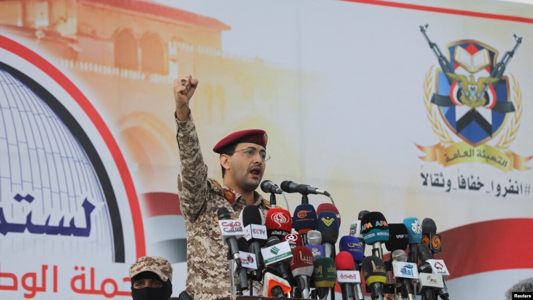 Houthi military spokesperson Yahya Saree delivers a statement in which he claimed an attack on the ship Lobivia, during a pro-Palestinian rally in Sanaa, Yemen, July 19, 2024.