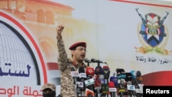 Houthi military spokesperson Yahya Saree delivers a statement in which he claimed an attack on the ship Lobivia, during a pro-Palestinian rally in Sanaa, Yemen, July 19, 2024.