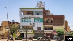 A vehicle of the paramilitary Rapid Support Forces drives down al-Sittin (sixty) road in Khartoum, Sudan, on May 22, 2023, as fighting persists between two rival generals. 