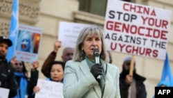 FILE - Helena Kennedy, a member of the House of Lords, speaks at a vigil in London, Feb. 13, 2023, protesting the planned visit to the UK of Erkin Tuniyaz, governor of the Xinjiang Uyghur Autonomous Region.