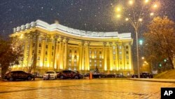FILE - The Ukrainian Foreign Ministry is seen during snowfall in Kyiv. Prior to the invasion by Russia, hackers knocked offline or defaced Ukrainian government websites. (Ukrainian Foreign Ministry Press Service via AP)