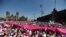 People take part in a protest in support of the National Electoral Institute (INE) and against President Andres Manuel Lopez Obrador's plan to reform the electoral authority, in Mexico City, Mexico, Feb. 26, 2023. 