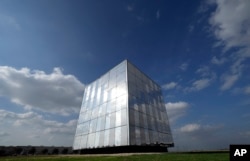 Last Energy's demonstration unit that contains a prototype reactor, is shown Tuesday, Jan. 17, 2023, in Brookshire, Texas. For the company's CEO, Bret Kugelmass, the urgency of the climate crisis means zero-carbon nuclear energy must be scaled up soon. (AP Photo/David J. Phillip)