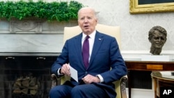 FILE - President Joe Biden speaks during a meeting in the Oval Office at the White House, April 15, 2024. Biden on June 5, 2024, congratulated Indian Prime Minister Narendra Modi with his reelection.
