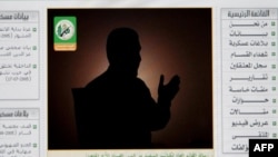 FILE - A photo taken from militant group Hamas' web site shows Palestinian militant Mohammed Deif in an Internet video on Aug. 27 2005. 