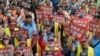 Workers, activists across Asia and Europe hold May Day rallies to call for greater labor rights 