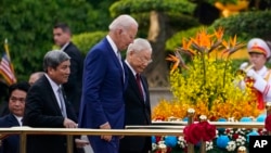 U.S. President Joe Biden participates in a welcome ceremony hosted by Vietnam's Communist Party General Secretary Nguyen Phu Trong at the Presidential Palace in Hanoi, Sept. 10, 2023.