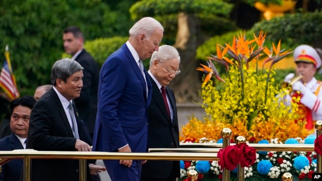 U.S. President Joe Biden participates in a welcome ceremony hosted by Vietnam's Communist Party General Secretary Nguyen Phu Trong at the Presidential Palace in Hanoi, Sept. 10, 2023.