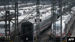 FILE - ICE high speed trains of Germany's railways operator Deutsch Bahn are parked on railtracks in Munich, southern Germany, during a strike of rail workers, Apr. 21, 2023.