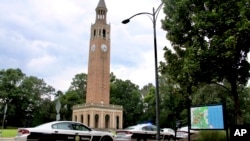 Law enforcement respond to a shooting at the University of North Carolina at Chapel Hill campus in Chapel Hill, N.C., on Aug. 28, 2023. One person, a faculty member, was killed in a campus laboratory and a suspect is in custody. 