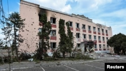 A view shows a building damaged during recent fighting between Ukrainian and Russian forces in Sudzha, Kursk region, Russia, Aug. 16, 2024.