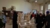 People visit the Iraqi National Museum in Baghdad, Iraq, Friday, Feb. 24, 2023, which reopened to the public after months or maintenance work.