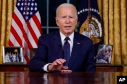 President Joe Biden speaks from the Oval Office of the White House, Oct. 19, 2023, in Washington, about the war in Israel and Ukraine.
