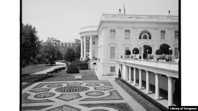 Flower beds near the south entrance of the White House circa 1900-1915.