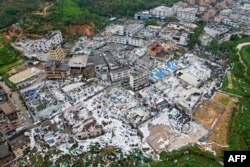 Tornado merusak bangunan di Guangzhou, China Selatan. Lima tewas dan 33 luka-luka akibat tornado pada 27 April, sebagai ilustrasi. (Foto: CNS/AFP)