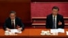 中國領導人習近平和李強在北京人大會堂出席全國人大會議。（2023年3月7日）