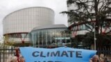 FILE —People demonstrate outside the European Court of Human Rights, Apr. 9, 2024 in Strasbourg, eastern France.