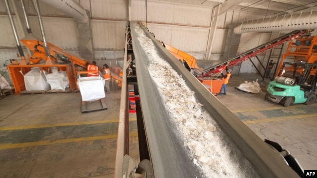 Smashed solar pannels are ictured at the We Recycle Solar plant in Yuma, Arizona, Dec. 6, 2023.