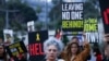 FILE - People attend a protest demanding the release of hostages kidnapped in the deadly October 7 attack on Israel by the Palestinian Islamist group Hamas from Gaza, in Tel Aviv, Israel, April 8, 2024. 