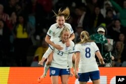 England's Alessia Russo (23) celebrates after scoring her side's second goal during the Women's World Cup quarterfinal soccer match against Colombia at Stadium Australia in Sydney on Aug. 12, 2023.