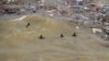 Divers look for flood victims in Derna, Libya, Sept. 18, 2023. 